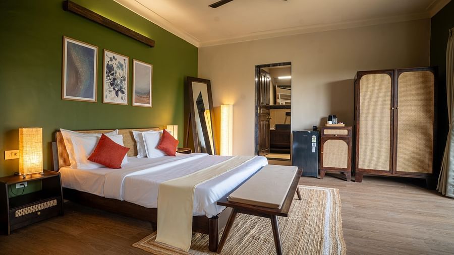Bright bedroom with earthy tones and sleek furniture at Kssemya.