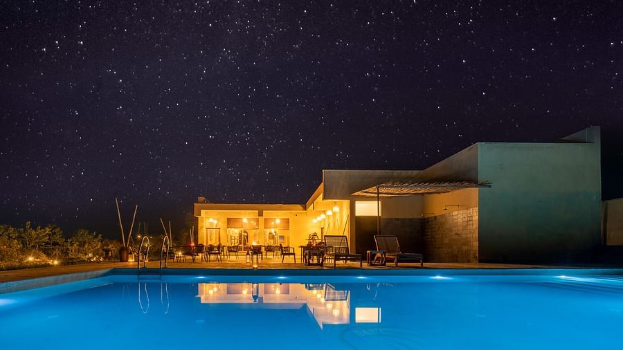 An image of a pool near the Rosette resto bar in Kurja Jawai at night time