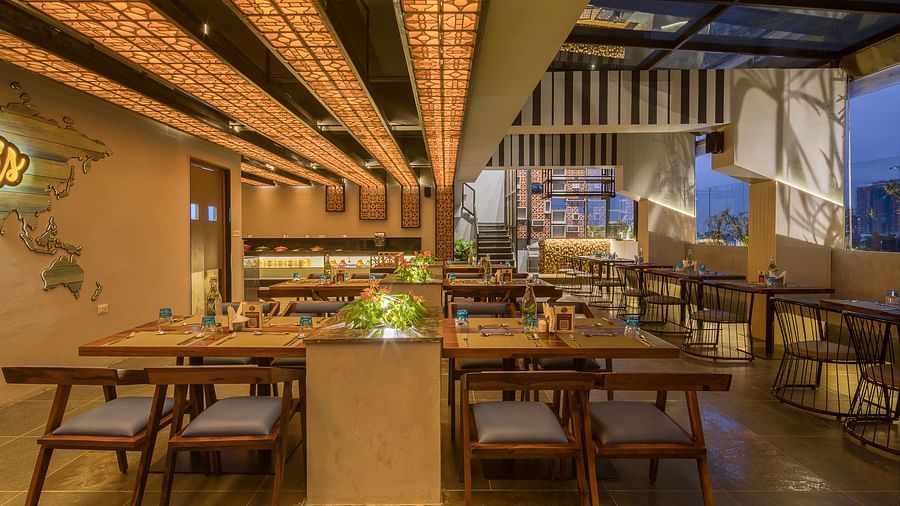 Interior seating at Roastopolis Restaurant at Le Foliage by TGI, Bangalore 