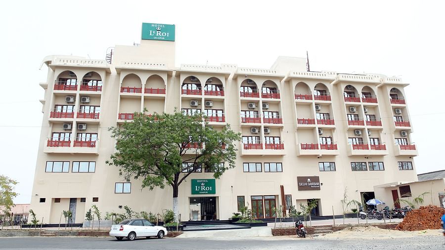 exterior view of hotel building shot from a lower angle captured during the day - le roi udaipur hotel2