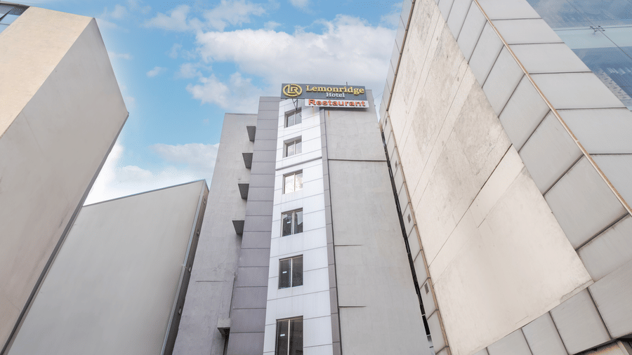 Daytime view of the hotel's facade at Lemonridge by Monday Hotels - Kukatpally.
