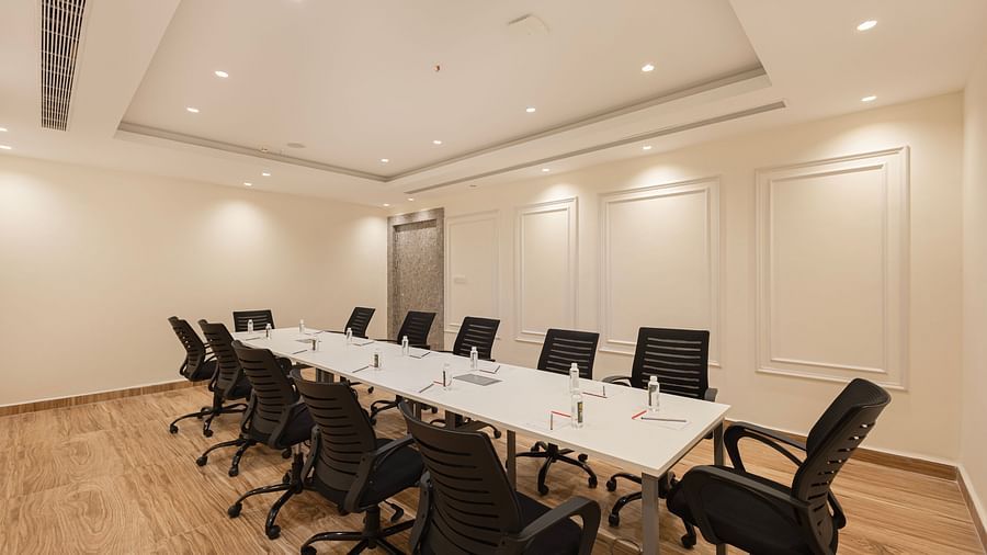A corner view of the boardroom seating arrangement near the entrance at Lemonridge Hotels, IDPL Balanagar.
