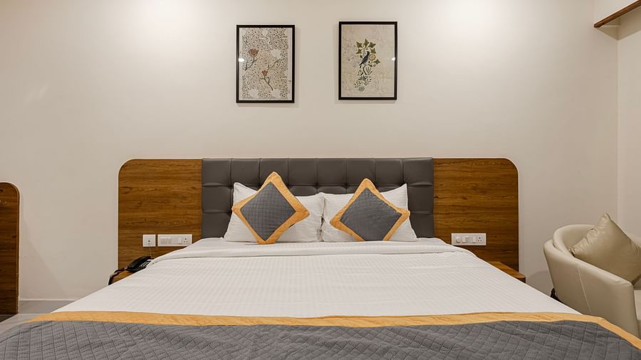 Family-friendly room with a king size bed and modern amenities at Lemonridge Hotels, IDPL Balanagar