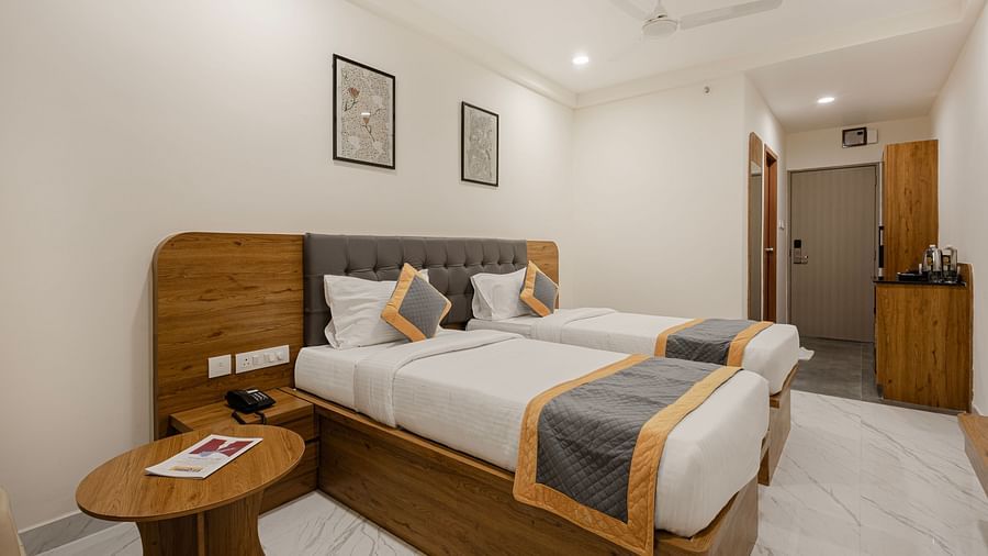 Corner angle of the twin bedroom with light and contemporary design at Lemonridge Hotels, IDPL Balanagar