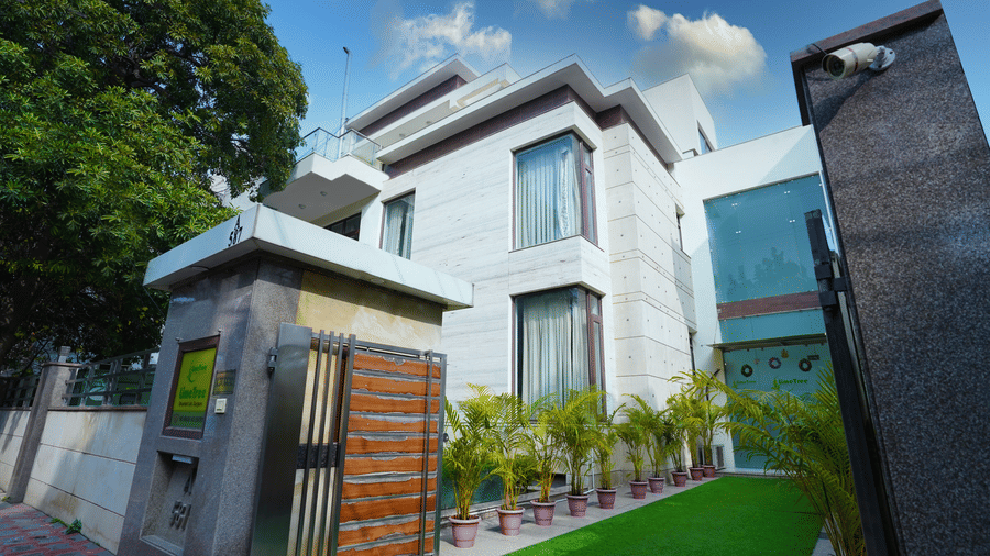 exterior view of the Lime Tree hotel near IFFCO Chowk Metro Station