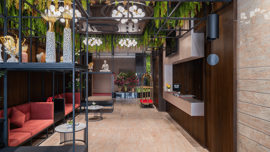 Elegant hotel lobby with stylish seating and contemporary decor at Lords Inn Sanand Gujarat.