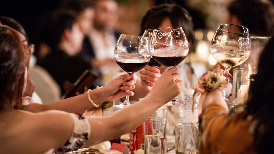 A group of people celebrating as they toast with wine glasses - Maikhao Dream Villa Resort & Spa, Phuket