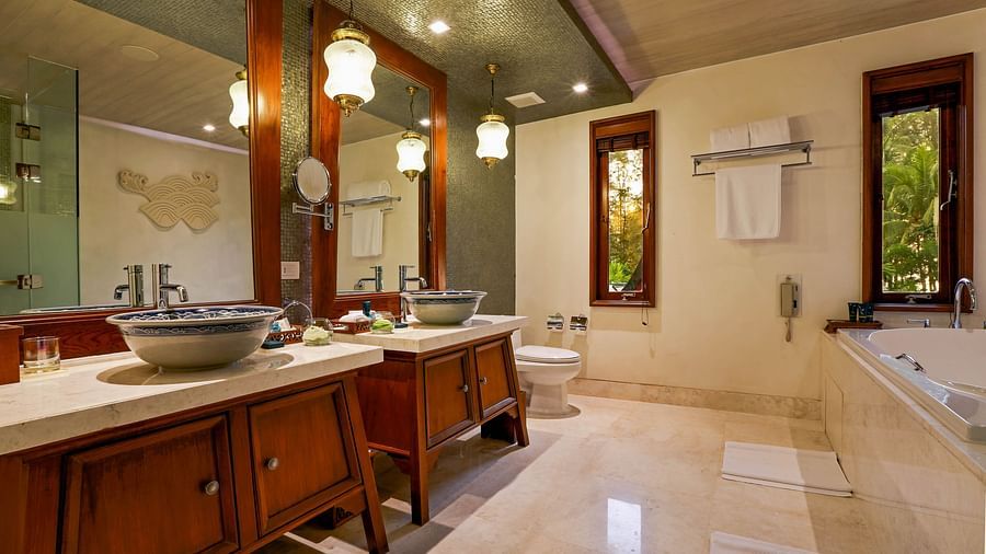 image of a luxurious bathroom with two sinks - one bedroom private pool beachfront villa