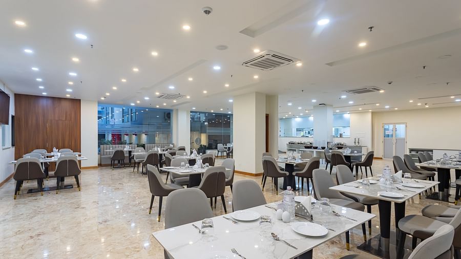 Close up view of dining tables placed spaciously at the Blue Coriander Restaurant at Mandala Norling Lords Prime in Kathmandu.