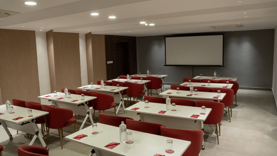 Well-lit conference room with organized seating for discussions at Mandala Norling Lords Prime Kathmandu.