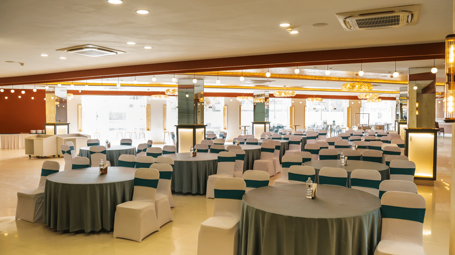 Spacious dining setup with round tables at Mandala Norling Lords Prime Kathmandu.