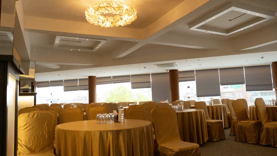 Elegant event space with round table seating at Mandala Norling Lords Prime Kathmandu.