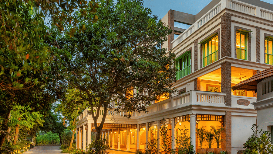 Mango Hill Auroville resort exterior with French-inspired architecture