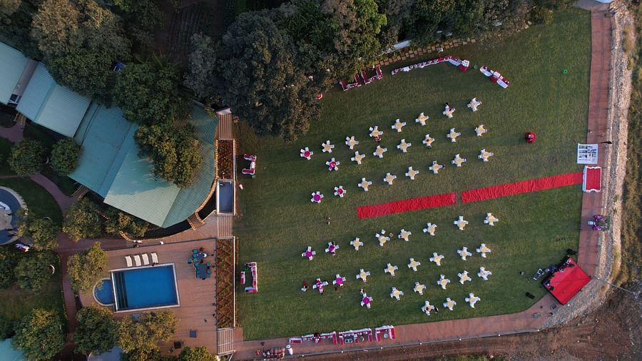 Aerial view of the open-air banquet at Mango Leaf Lake Resort, Pune