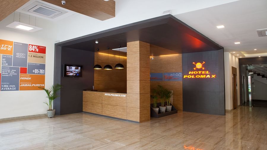 the reception area at our hotel featuring an expansive lobby - Max Hotel Jabalpur