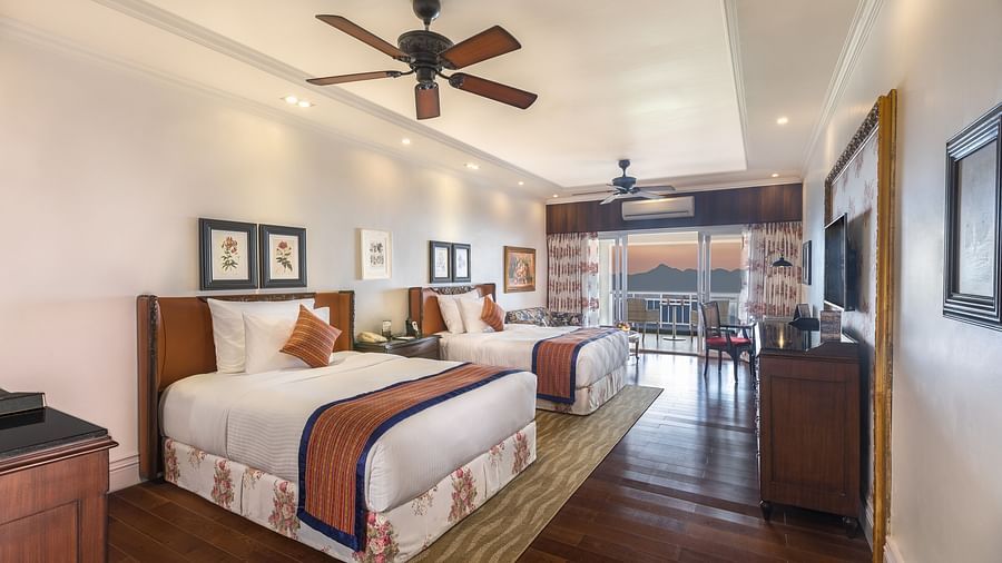 twin beds facing the TV - Mayfair Himalayan Spa Resort Kalimpong 1