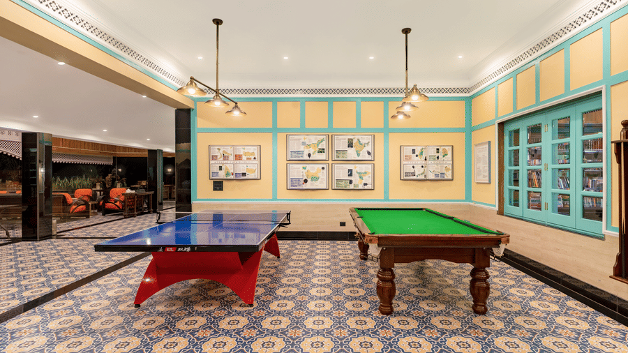 Indoors recreation room featuring table tennis and a snooker table at Mayfair Manor, Jungpana.