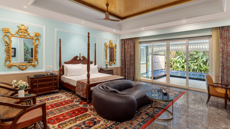 Deluxe Suite bedroom with elegant furnishings at Mayfair Oasis Resort, Jharsuguda