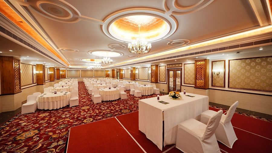 indoor seating space at a banquet hall - Mayfair Tea Resort, Siliguri 3