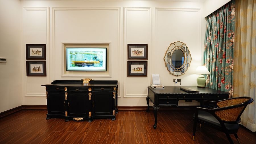 a wooden cabinet and a workstation - Mayfair Tea Resort, Siliguri 