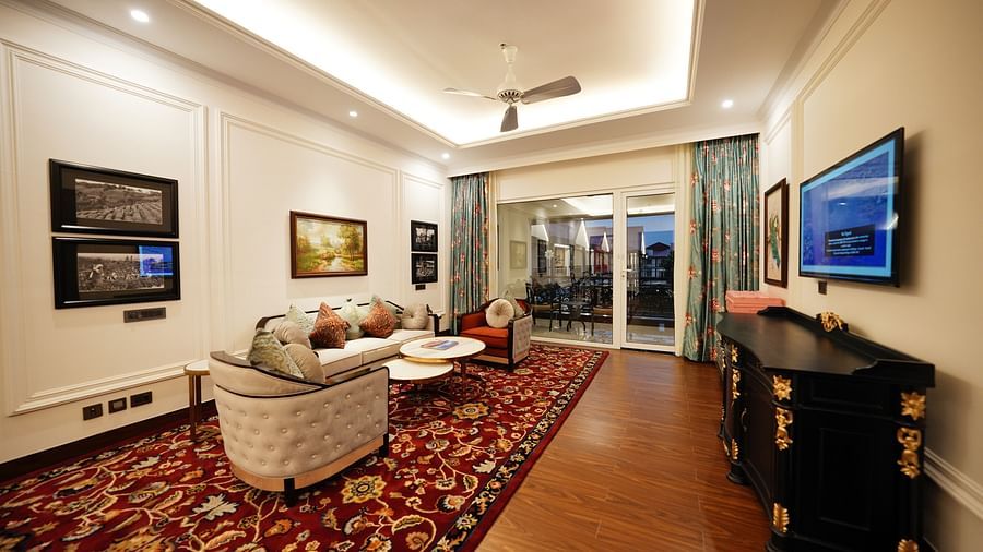 sofa sets and a tv in the living room area - Mayfair Tea Resort, Siliguri 
