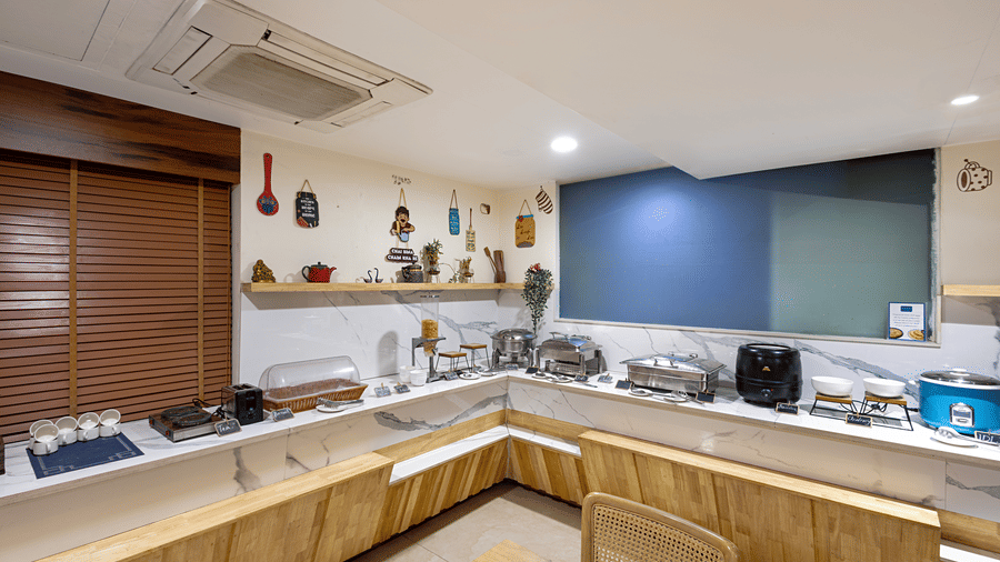 Spacious restaurant interior at Monday Hotels HITEC City Hyderabad featuring modern seating stylish decor and contemporary dining ambience