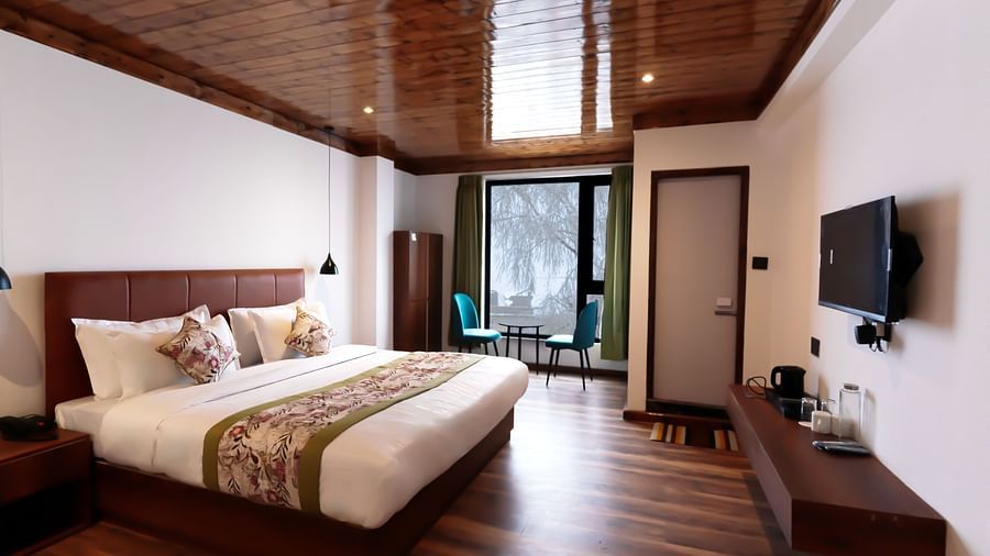 view of the premium room with large bed at Mystique Valley Resort  