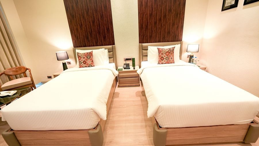 An image showcasing the twin beds in Superior Temple View - Twin Rooms - NAMAMI BY ZENQ BANKHANDI