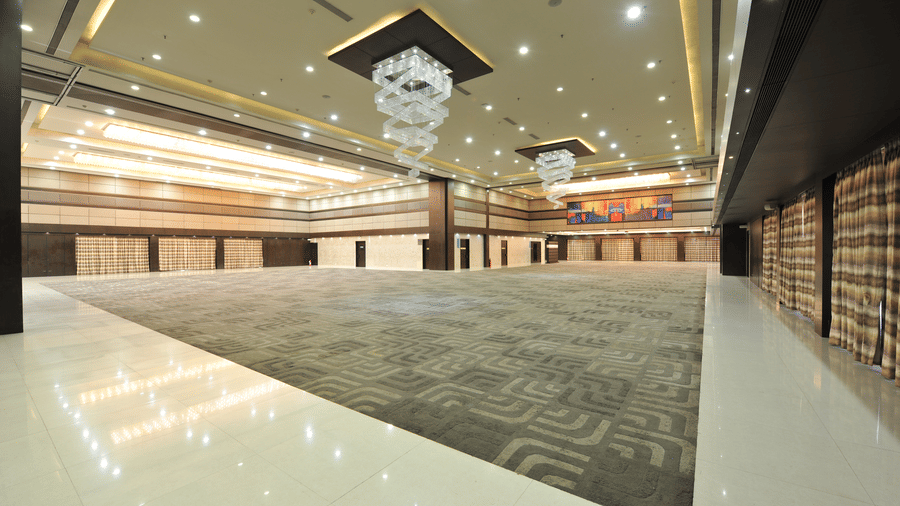Spacious conference hall with grand ceiling and stylish interiors – Narayani Heights Hotel & Resorts