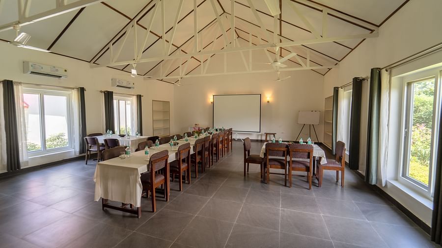 Conference hall with chairs and tables at Neer Ganga Resorts
