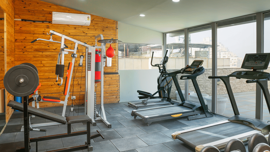 The gym at Nemesia City Center with many gym equipments.