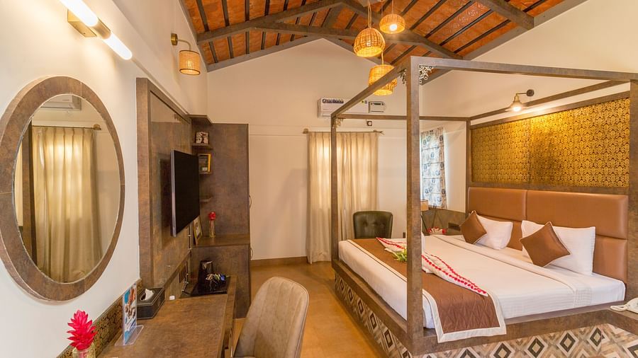 Premium room with traditional decor and cosy ambience at Nirantara Resort & Spa