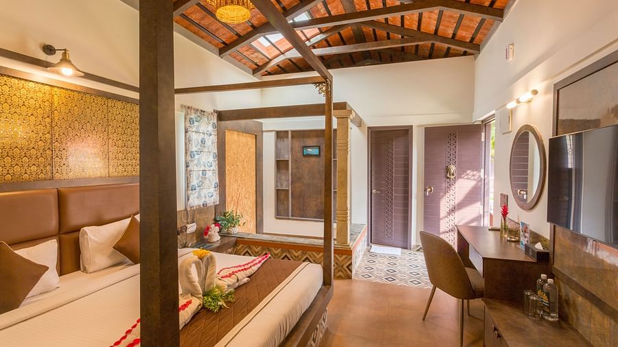 Premium room with ambient lighting and luxurious decor at Nirantara Resort & Spa