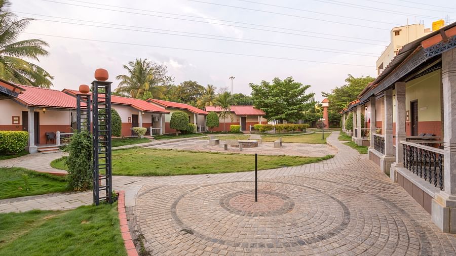 Circular paved courtyard with greenery and outdoor space at Nirantara Resort & Spa