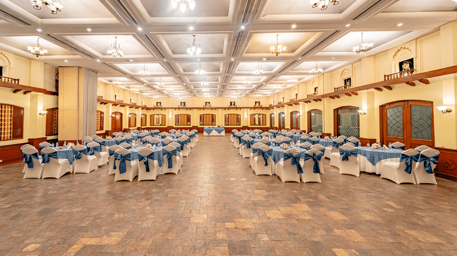 A back shot of the spacious Emperor Hall featuring ample walking space in the banquet hall at Noor-Us-Sabah Palace, Bhopal.