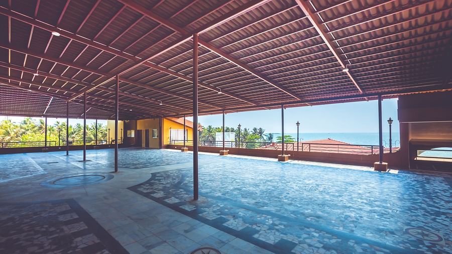 An outdoor event space covered using terracotta tiles at Paradise Isle Beach Resort, Udupi