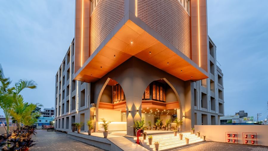 Close-up of the Pravasa Hotel entrance and building exterior | Pravasa Hotel, Vijayapura