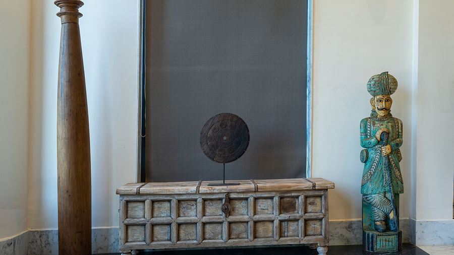 An image of a room where wooden box is placed along with that a mannequin is placed - Rajbagh Wellness