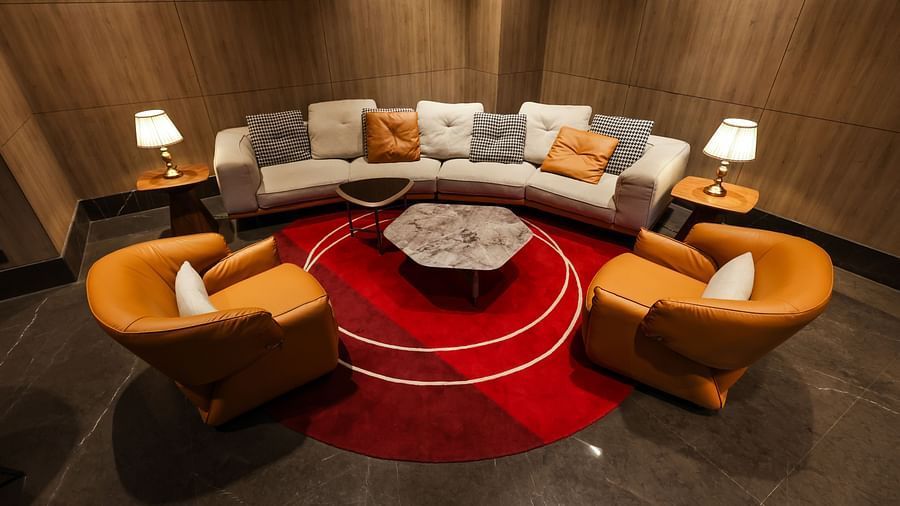 Contemporary circular lounge seating with warm lighting at Ramada by Wyndham Sonipat Murthal