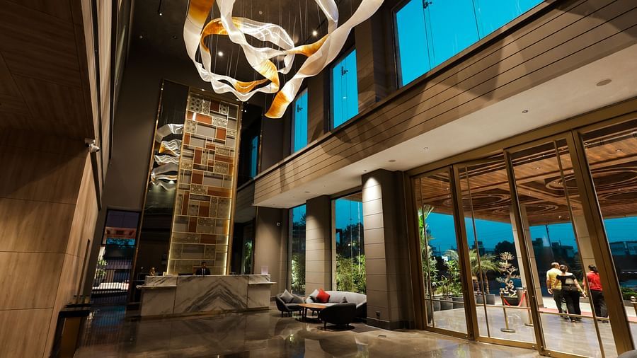 Spacious entrance lobby with modern design and natural light at Ramada by Wyndham Sonipat Murthal