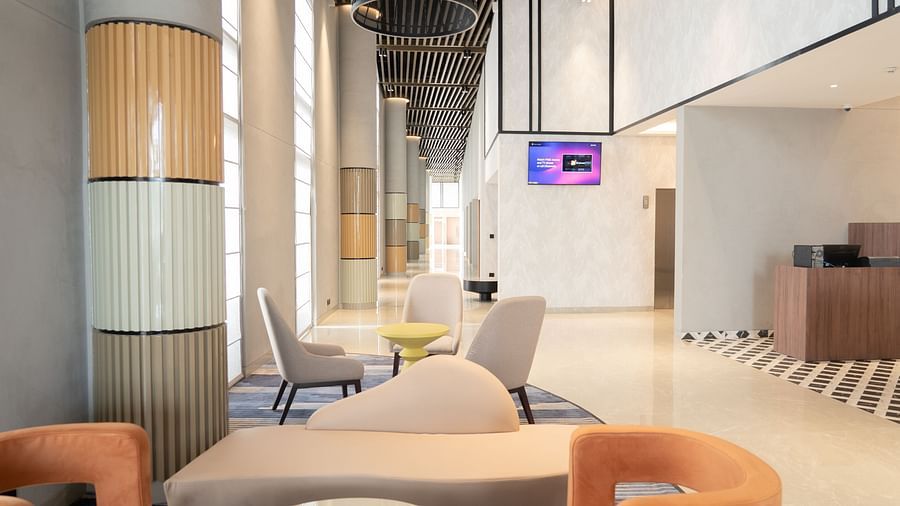 Sofa seating in the Tea Lounge at Ramada Encore, Bhiwadi.