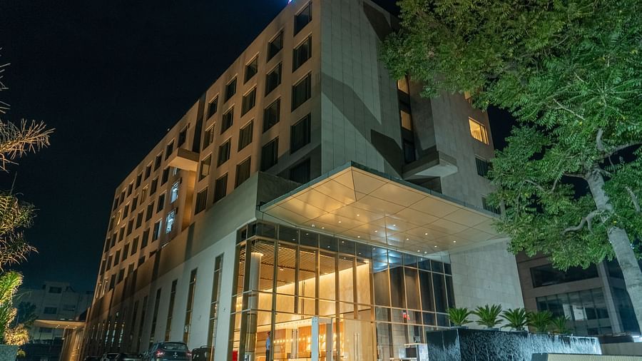 Facade image of Ramada Encore, Bhiwadi at night.