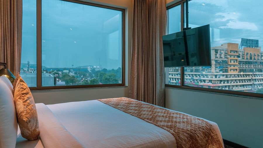 A king size bed of Junior Suite at Ramada Encore, Bhiwadi.