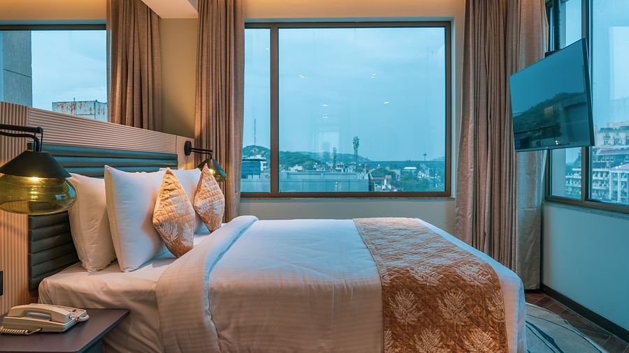 A king size bed of Junior Suite at Ramada Encore, Bhiwadi.