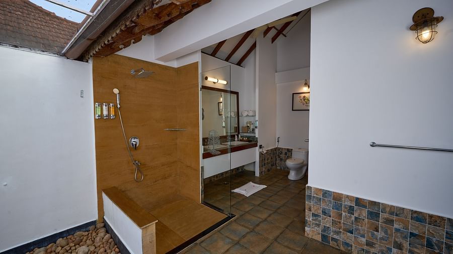 outdoor shower area inside one of the rooms - Rhythm Kumarakom