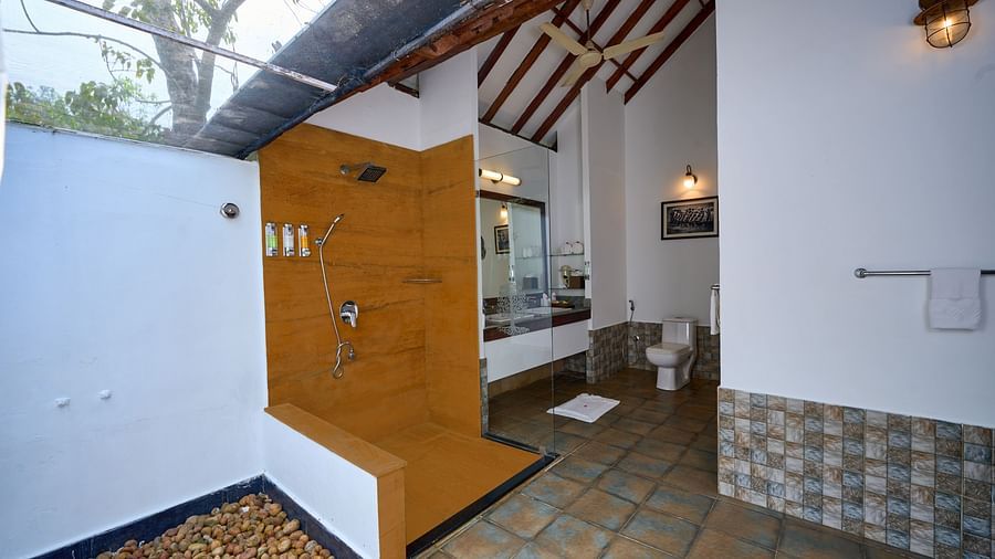 outdoor shower area inside one of the rooms - Rhythm Kumarakom