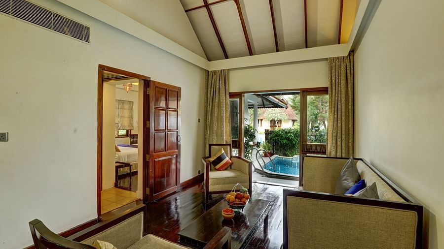 an overview of the living room inside one of the rooms - Rhythm Kumarakom