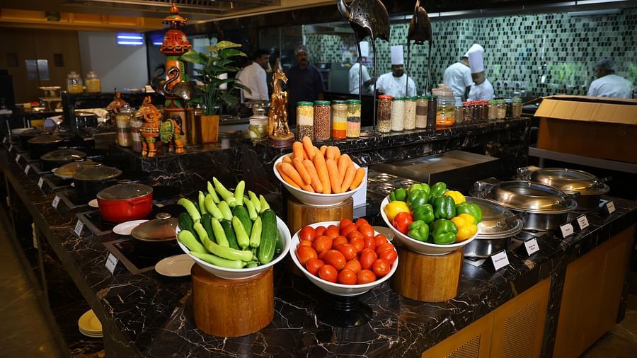 Delight in a variety of vegetarian and non-vegetarian options at The Buffet Square, SRM Hotel.