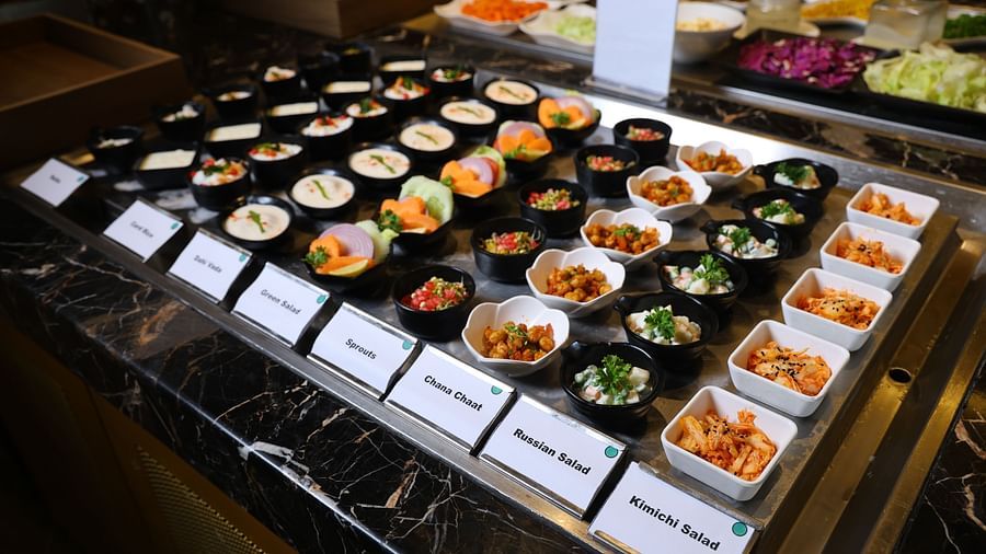 Freshly prepared dishes at The Buffet Square, showcasing the best of Indian and international cuisines.
