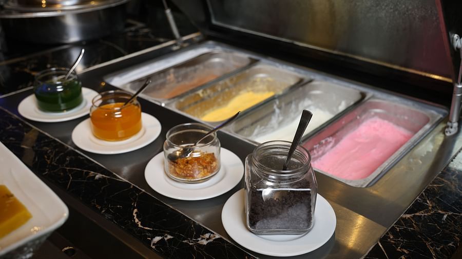 Dine in elegance at The Buffet Square, a vibrant restaurant with diverse culinary options at SRM Hotel.